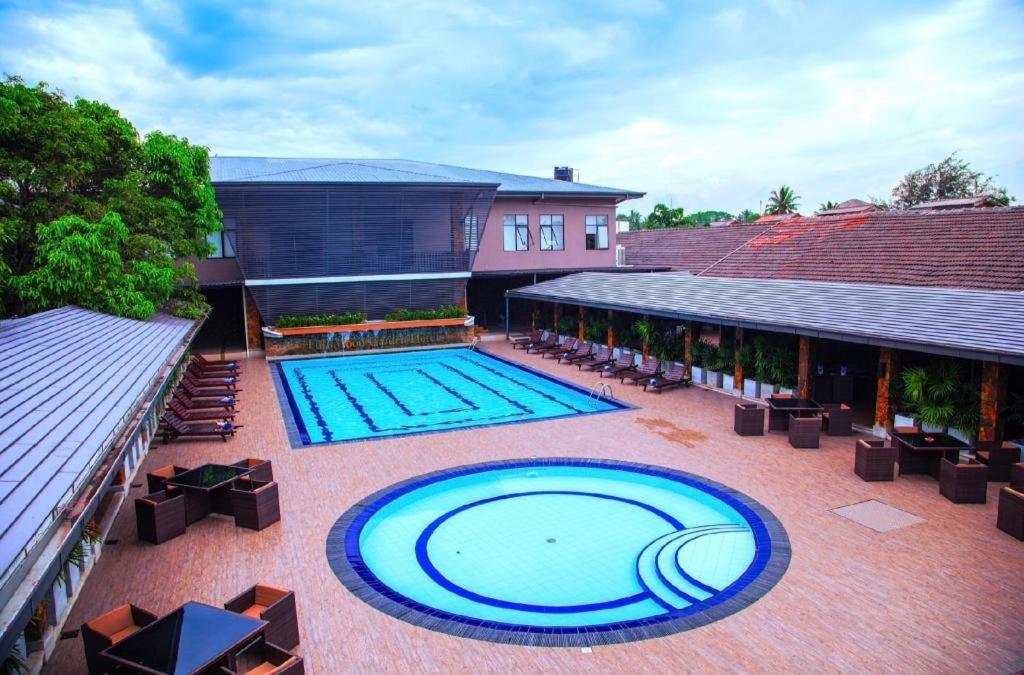 Full Moon Garden Hotel Негомбо Экстерьер фото
